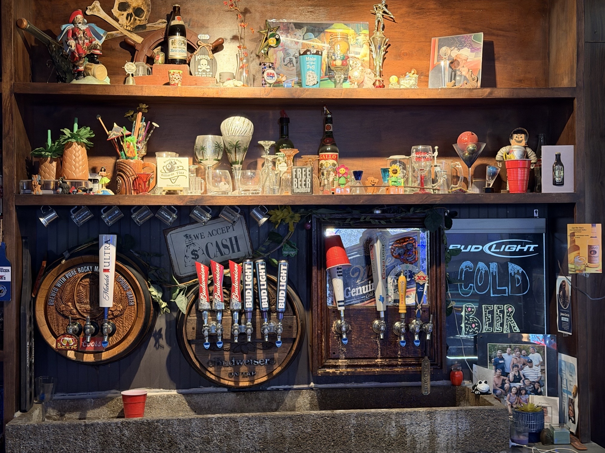 Beer taps and bar decor at Billiards Plus including Budweiser and Bud Light on tap